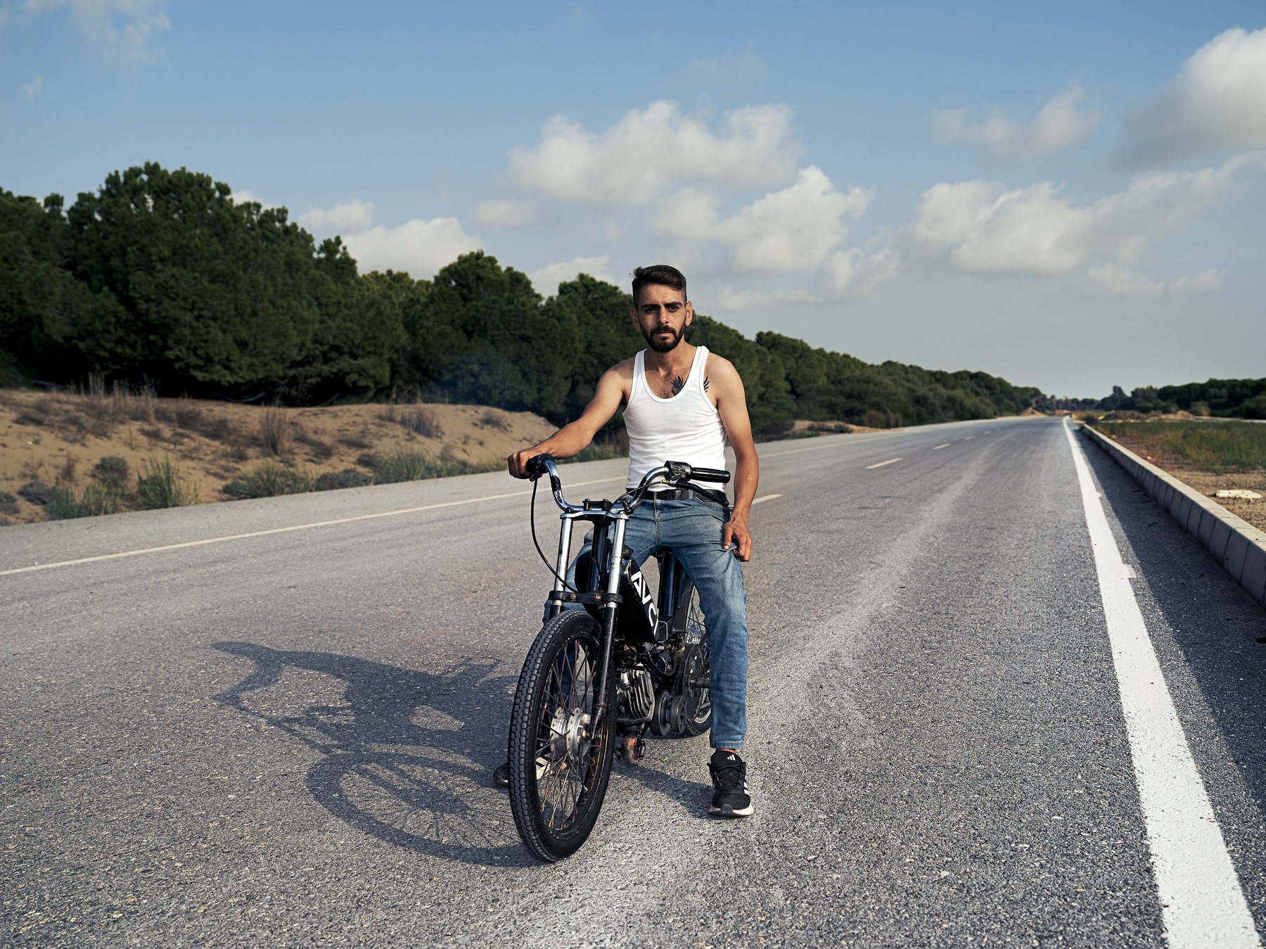 Riders and their customized motorcycles gathered on a road, Mersin, Türkiye